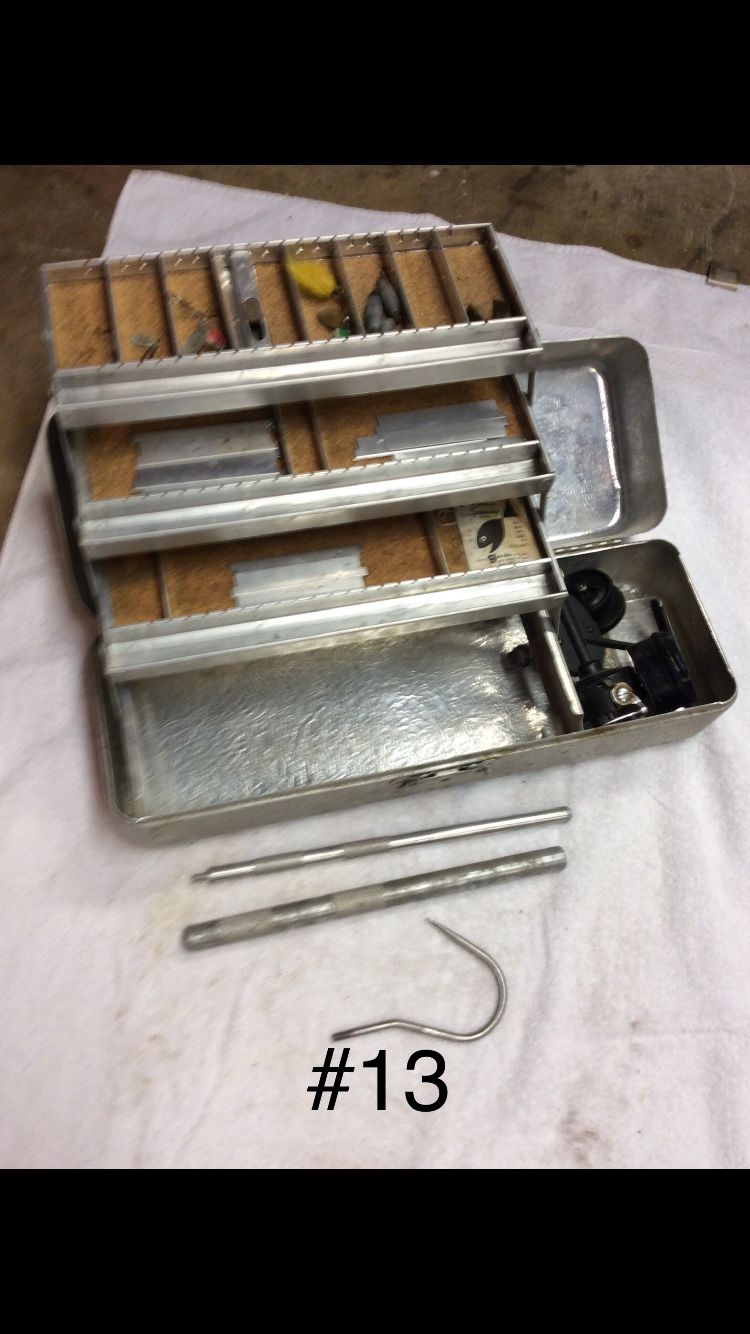 Tackle Box With Some Accessories And Gaff Hook.