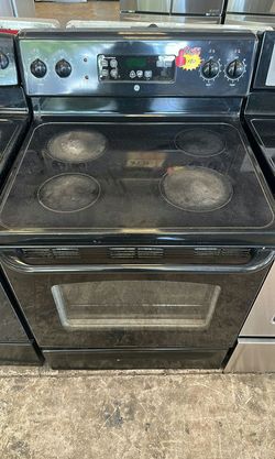Black GE Electric Range with Glass Top