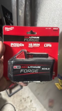 Milwaukee Inverter and 2 new Milwaukee batteries and a charger
