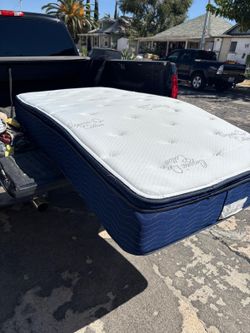 Twin mattress semi new