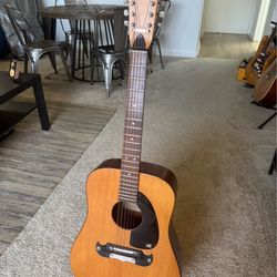 Framus 12 string Nashville Jumbo acoustic guitar with case and stand.