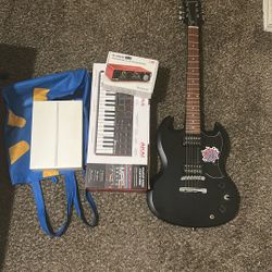 Epiphone SG Electric Guitar, MPK Mini Keyboard Plus, Audio Interface(Focusrite Scarlett 2i2), iPad 9th Generation.