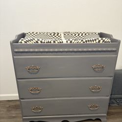 Crib and Dresser With Baby Changing Pad