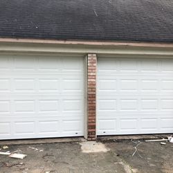 2 Used 8x7 Insulated Garage Doors