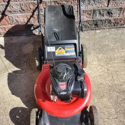 YARD MACHINES 5.5 H.P. MULCHING OR REAR BAG GAS MOWER ,DECK CLEANED,STARTS 1ST PULL RUNS GREAT, IN ALMOST LIKE NEW CONDITION