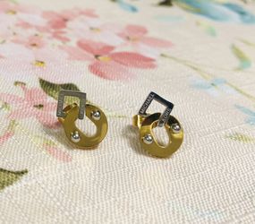 beautiful gold and silver stainless steel earrings MK new
