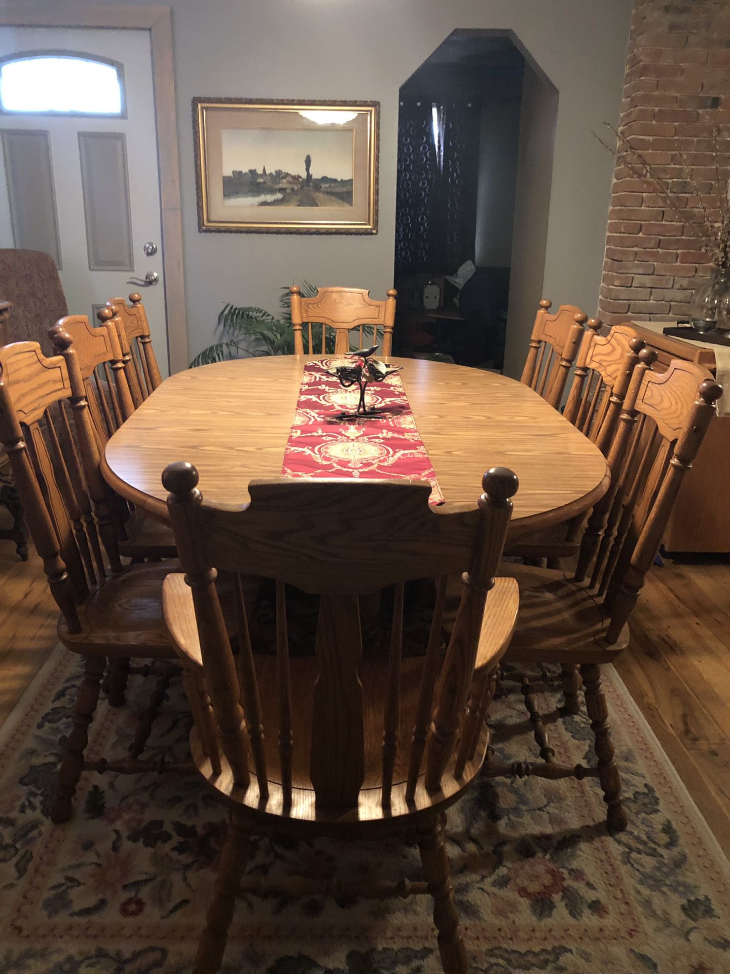 Oak Dining Room Table, dbl pedestal , 2 leafs, 8 chairs 2 pc. Hutch. Excellent condition. $800.00
