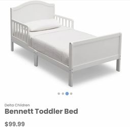 New Bennett white wood toddler bed frame (mattress sold separately)