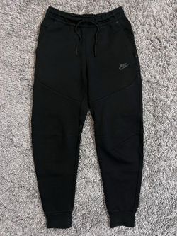 Black Nike tech sweatpants