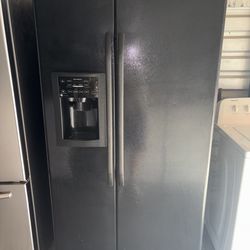 Black GE Refrigerator And Freezer