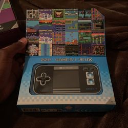 2 portable gaming systems 