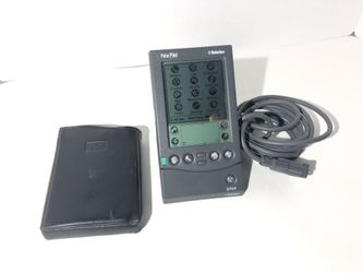 Palm Pilot Pro. With sync cradle and case
