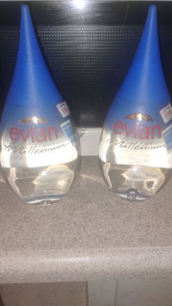 Millennium Evian glass bottles of water