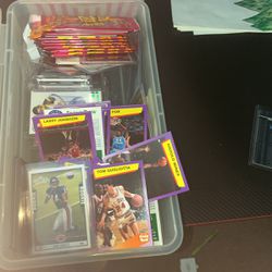 A Bin Of Football And Basketball Cards