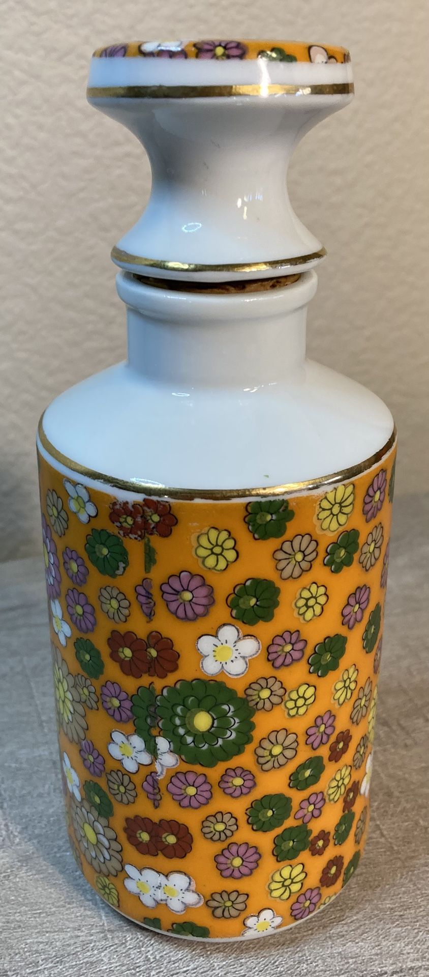 Orange Porcelain Bottle With Floral Motif