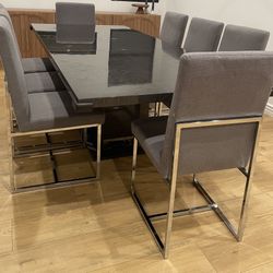 Modern Dining with 8 chrome upholstered dining chairs