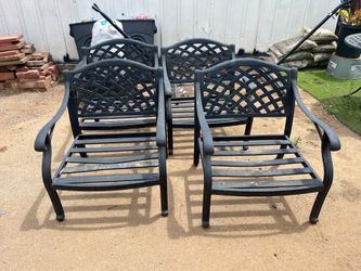 Four metal chairs