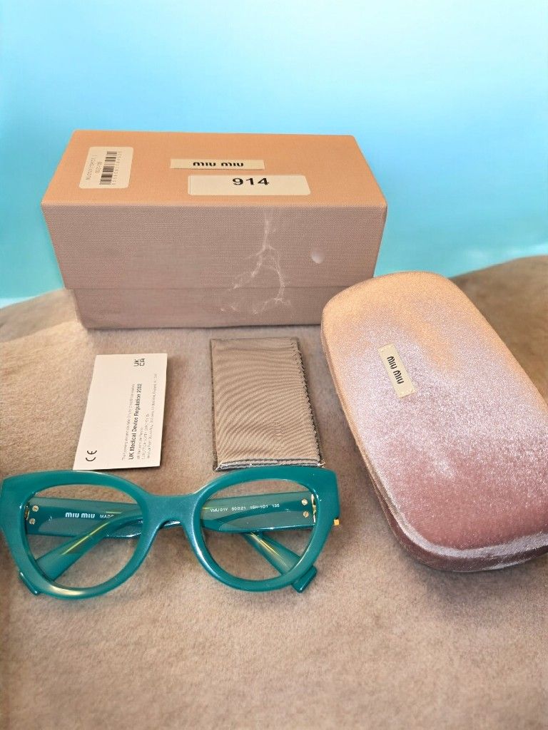 Miu Miu MU01VV 15H101
Women's Glasses Green 
