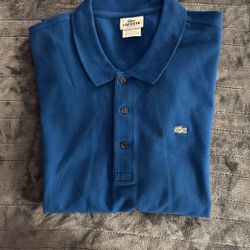 Men’s Polo Style Shirt By Lacoste For $7.50  