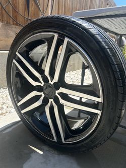 Black rims with tire