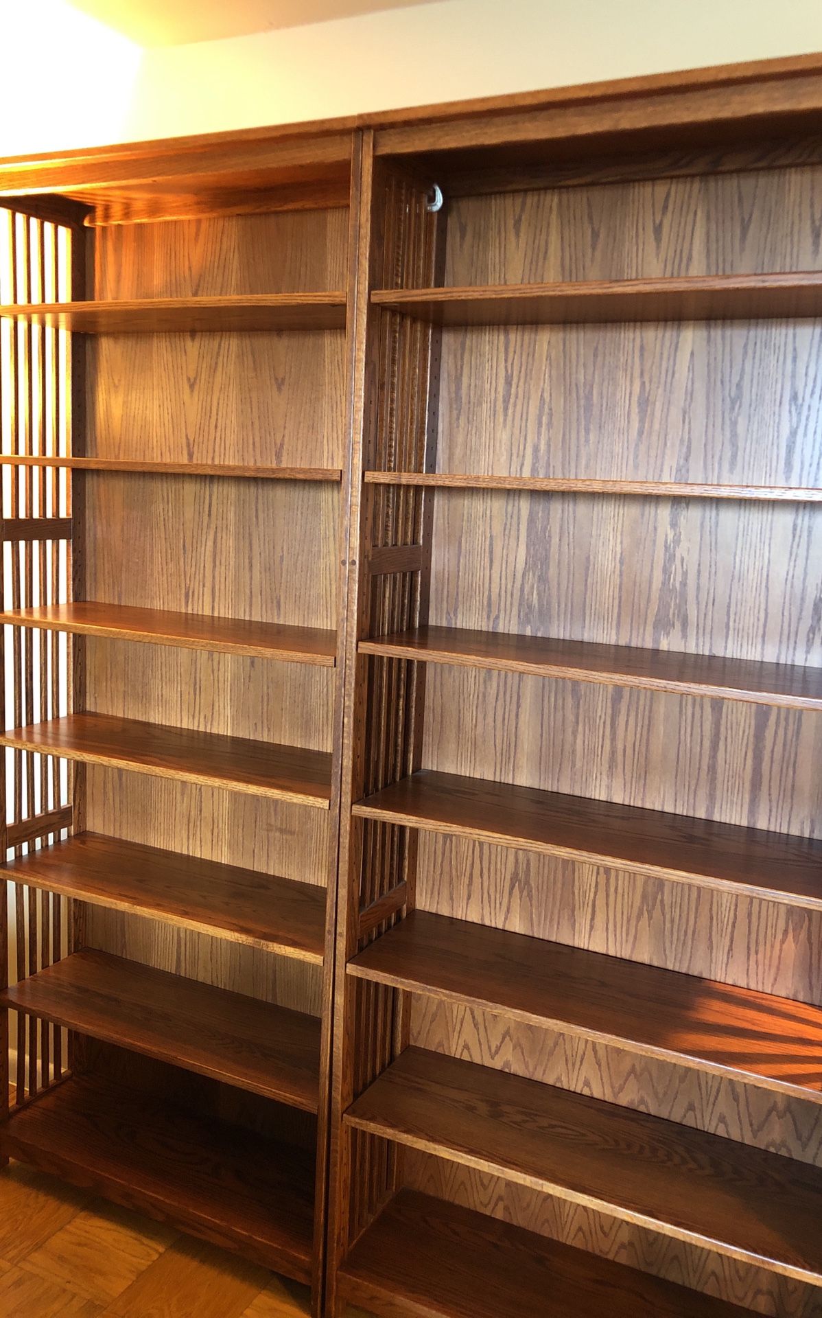Mission-style 7’ bookcases.