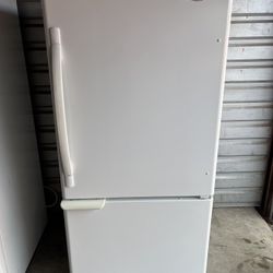 White Whirlpool Refrigerator And Freezer