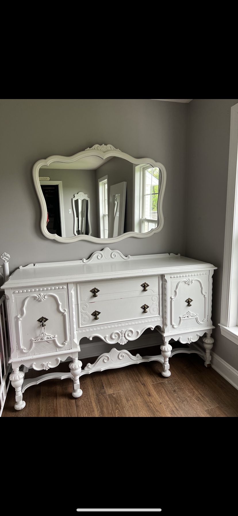 Fancy white dresser with matching mirror