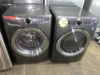 ELECTROLUX front load washer and electric dryer like new, with 4 months warranty