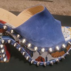 Christian Louboutin STUDDED RED BOTTOMS