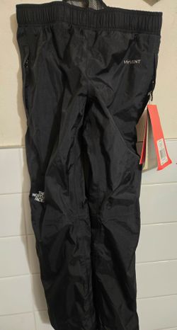 The North Face Kids/Youth Resolve Pants.
Color: Black with reflective details for safety.
Size: Youth XS / 6 (Boy)