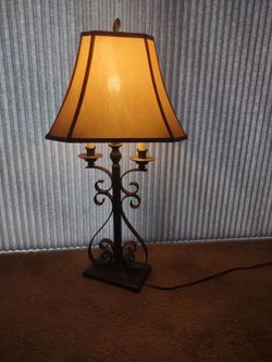 Table lamp, ornamental iron, $15 cash