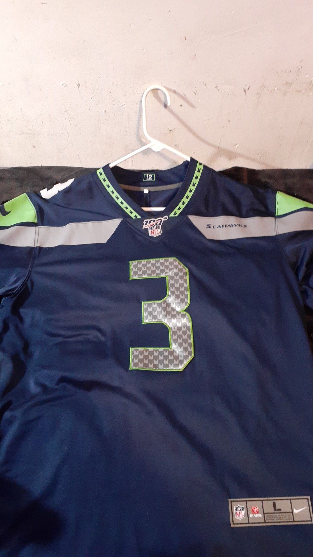 RUSSELL WILSON Nike NFL players official hundred year anniversary NFL Seahawks Russell Wilson Jersey size large never worn still has tags on it