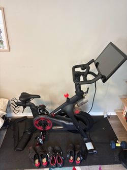 Original Peloton Bike + 4 pair cycling shoes