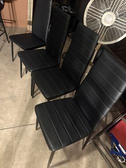 Faux leather black chairs