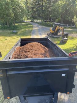Bark, Topsoil And Rock For Sale