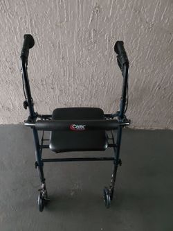 Used Carex Step n Rest Roller Walker