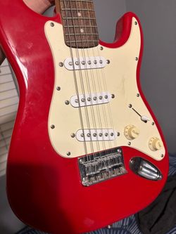 Squier Mini Stratocaster  3/4-size electric guitar & amp