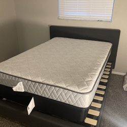 Hardly used full size Sealy mattress and box spring set with mattress protector.