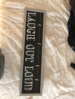 Laugh out loud home decor to hang pics from home goods
