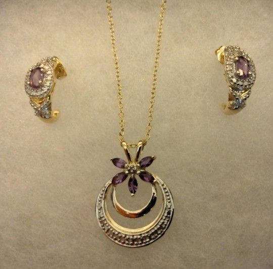 14k gold, amethyst and diamond necklace with matching earrings 