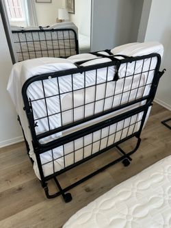 Twin sized foldable beds - $150