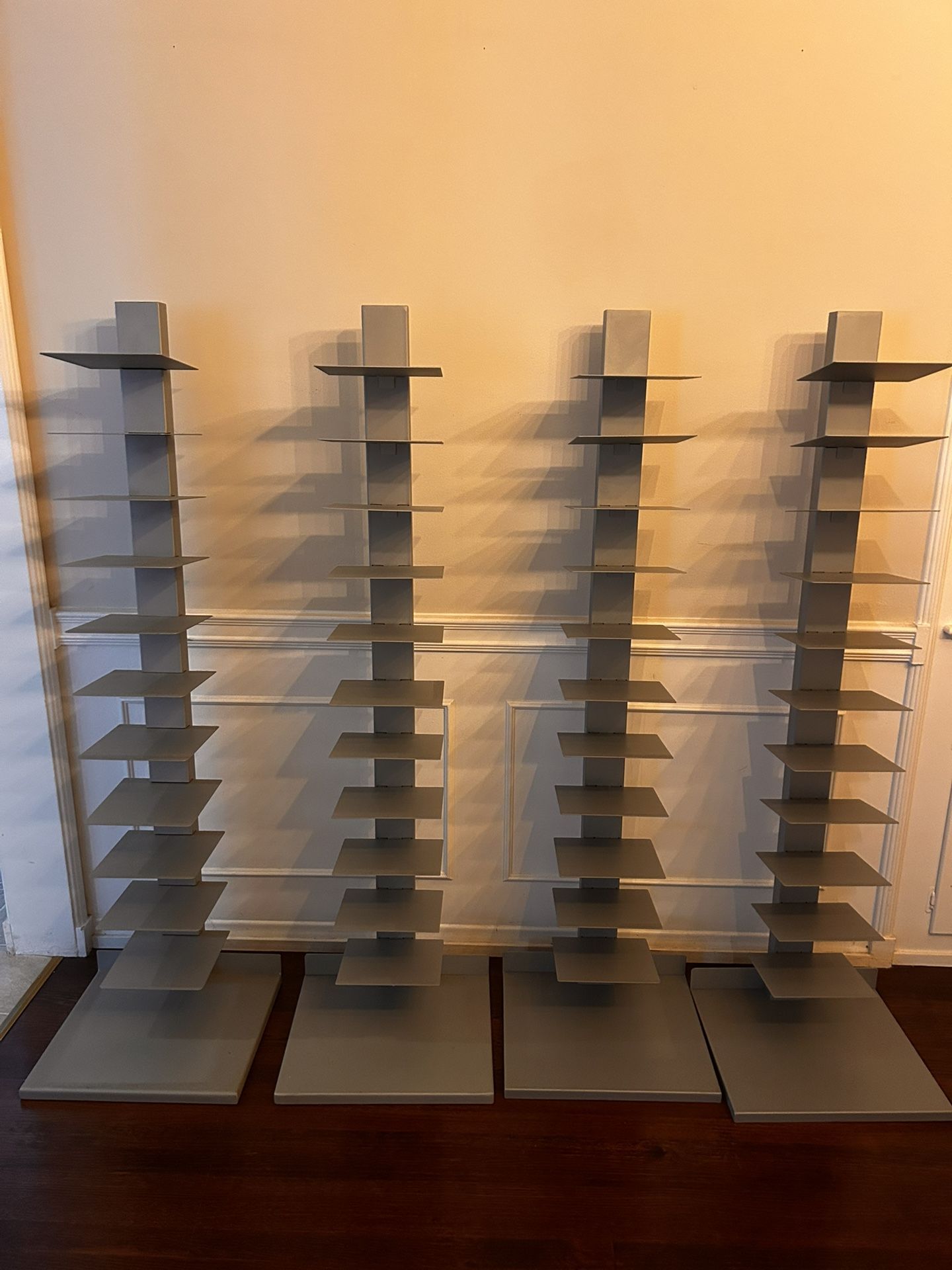 Four (4) Southern Enterprises Silver Spine Book Towers