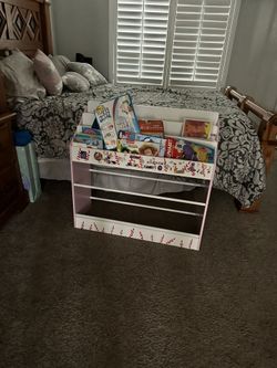 Kids Stand For Books And Toys