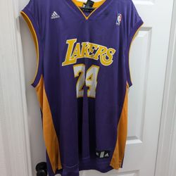 Adidas NBA Los Angeles Lakers Kobe Bryant #24 jersey in purple and gold. 