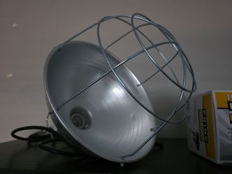 Lamp and two red heat bulbs
