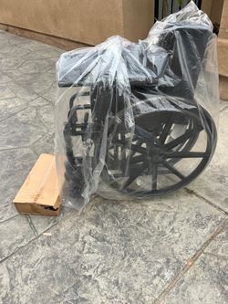 New wheel chair havy duty asking $180  thanks