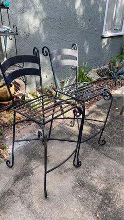 2 heavy metal chairs