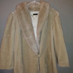Fur coat made in USA vintage has a few little marks faux