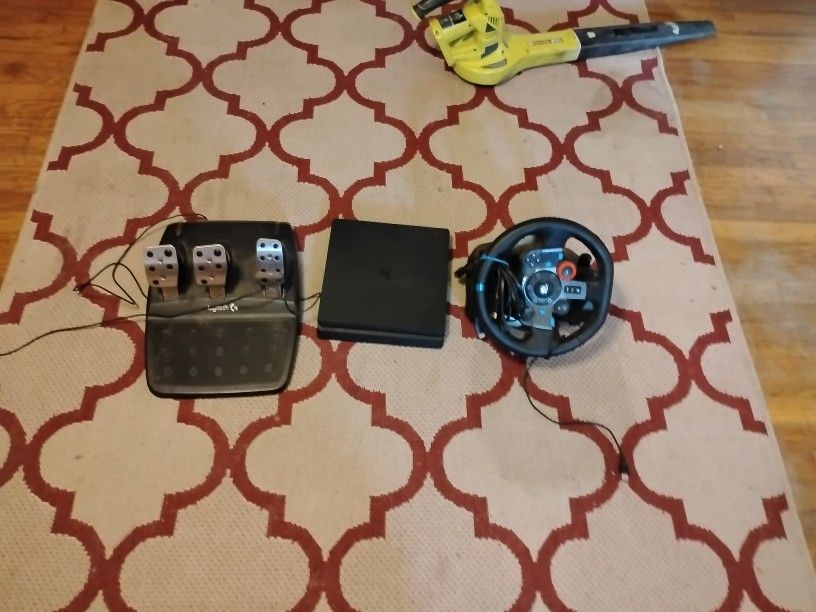 PlayStation 4 With Foot Pedals And Steering Wheel