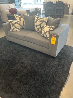 Two seat sofa with pillows